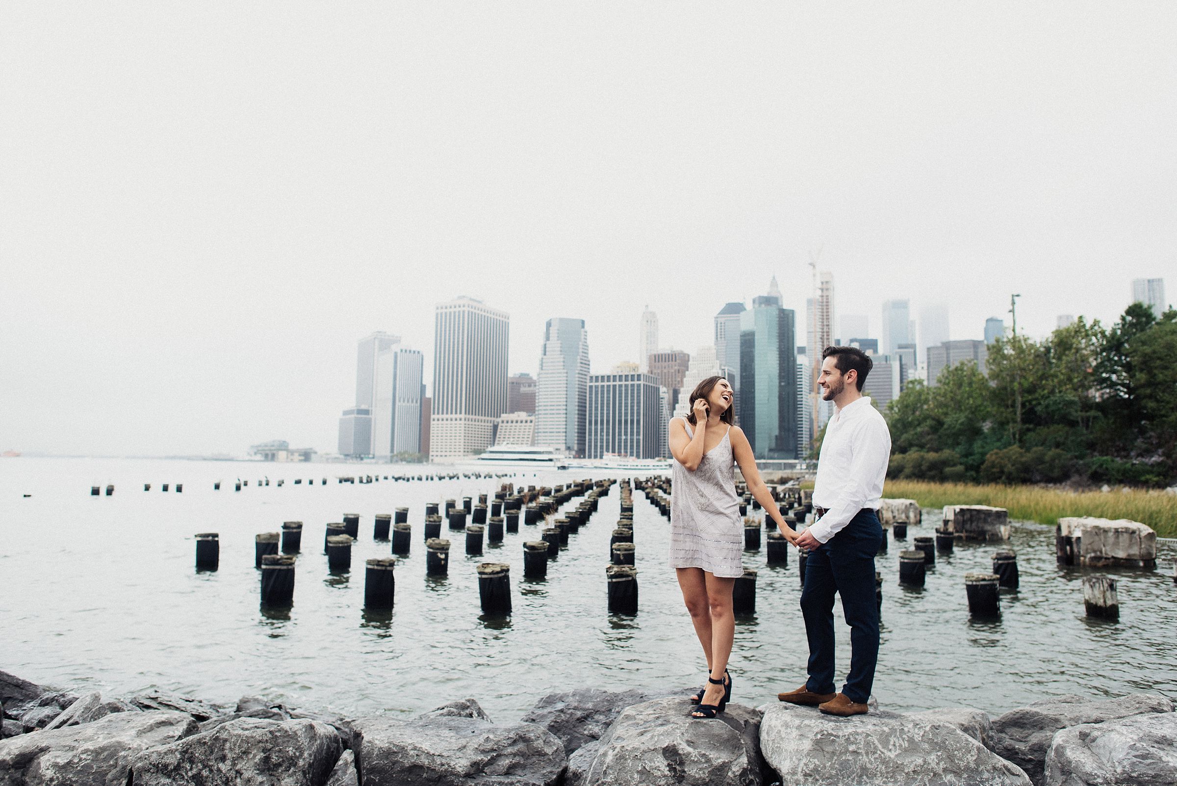 engaged couple in dumbo brooklyn