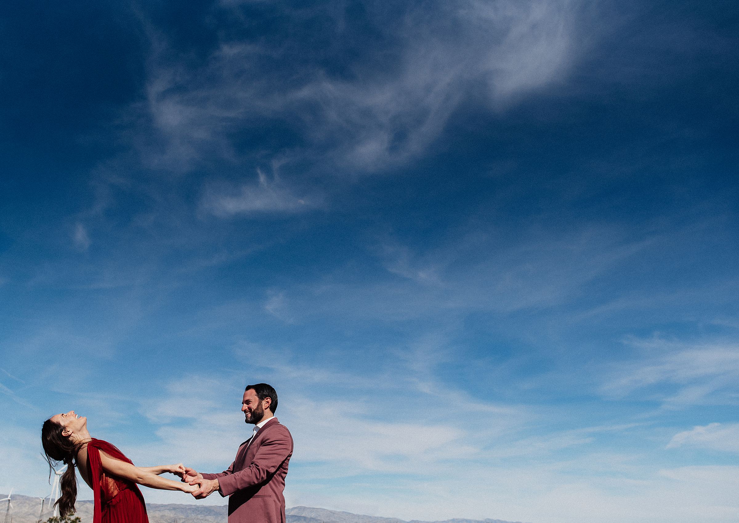 engaged couple at palm springs windmills